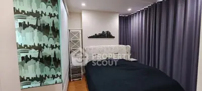 Modern bedroom with stylish cityscape decor and cozy ambiance