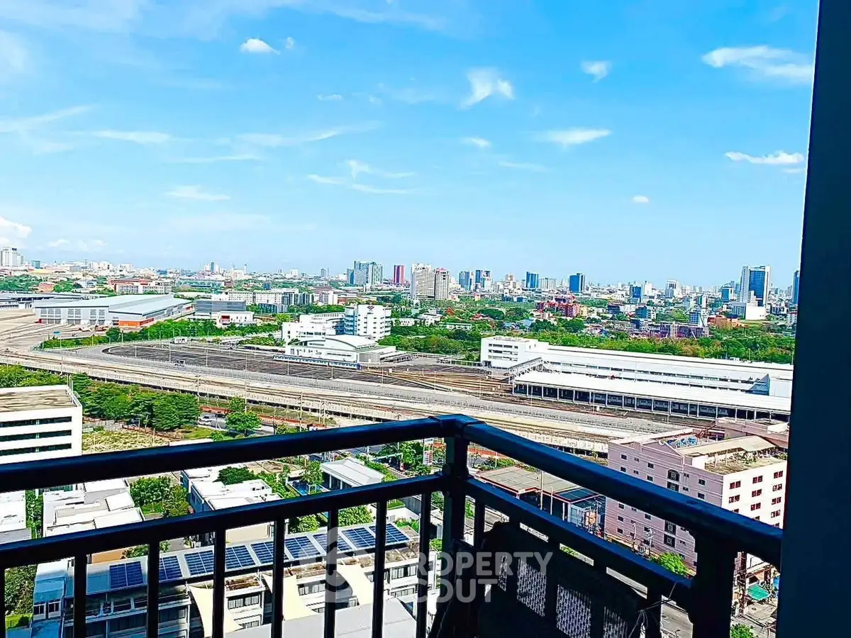 Stunning cityscape view from a high-rise balcony, perfect for urban living enthusiasts.