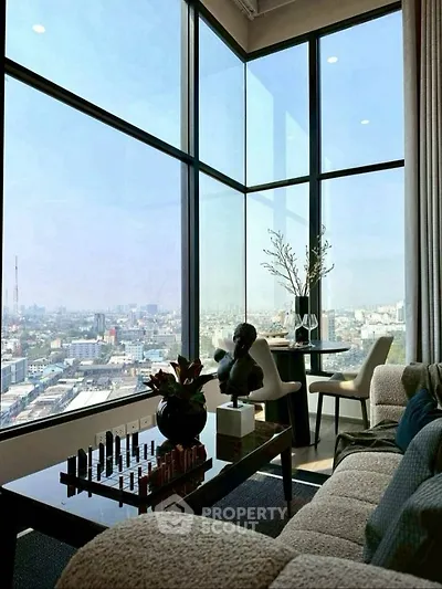 Luxurious living room with panoramic city view and elegant decor