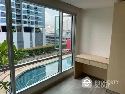 Modern condo with pool view and spacious interior near city center