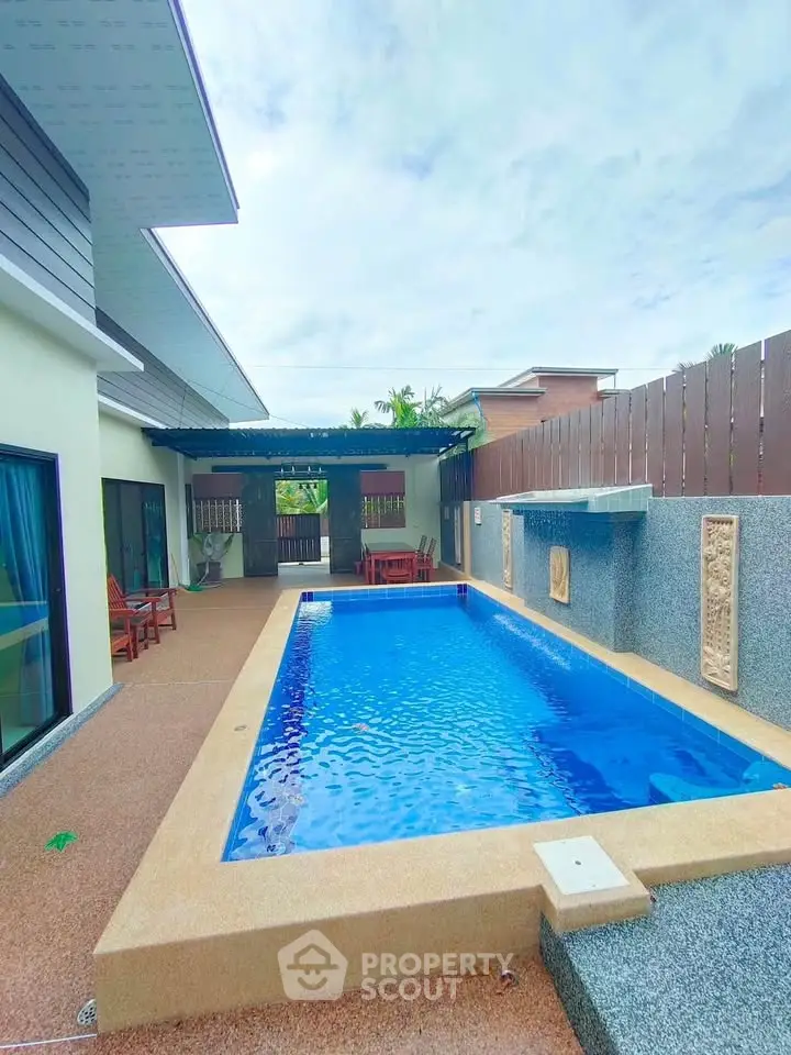Luxurious private villa with stunning pool and spacious outdoor area, perfect for relaxation and entertainment.