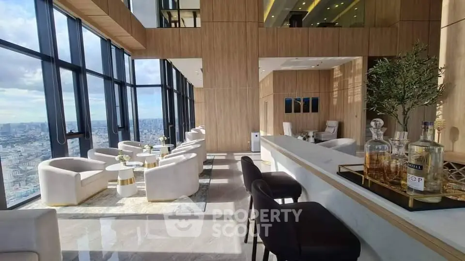 Luxurious high-rise living room with panoramic city views and elegant modern decor.