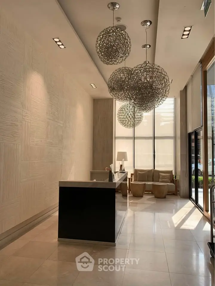 Luxurious modern lobby with elegant lighting and stylish seating area