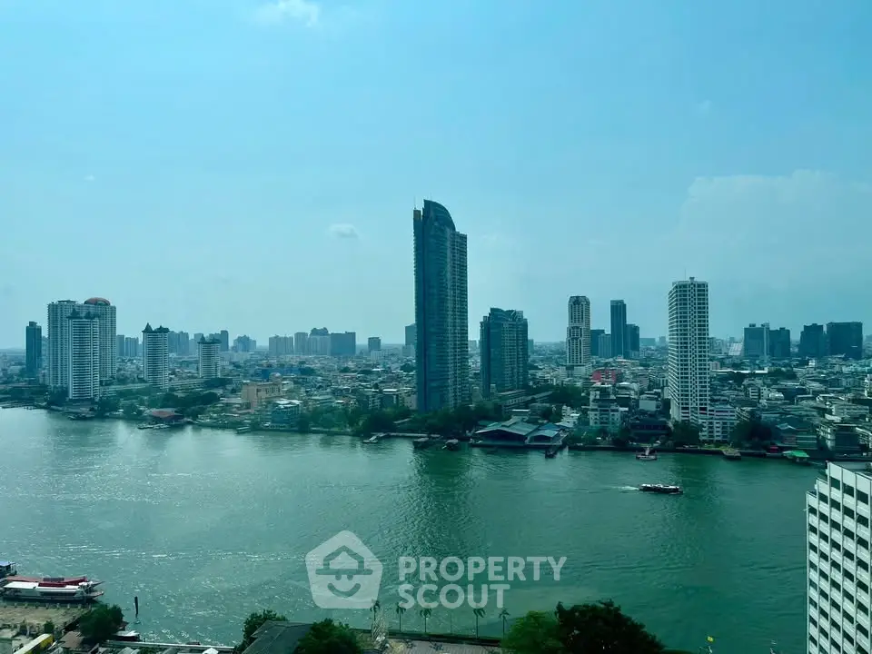 Stunning cityscape view with river and skyscrapers, perfect for urban living enthusiasts.