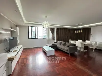 Spacious modern living room with elegant decor and city view