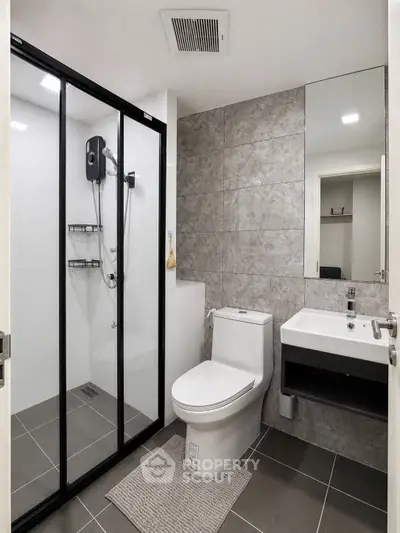 Modern bathroom with sleek shower and contemporary fixtures
