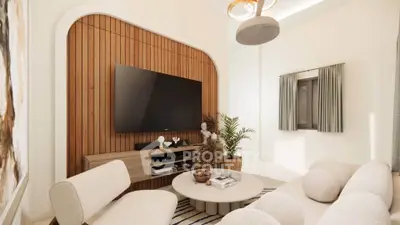 Modern living room with stylish furniture and wall-mounted TV