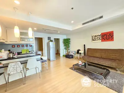 Spacious modern living room with open kitchen and stylish decor