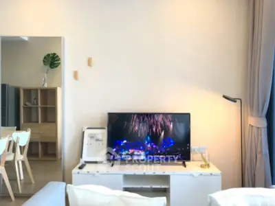 Modern living room with sleek TV setup and stylish decor