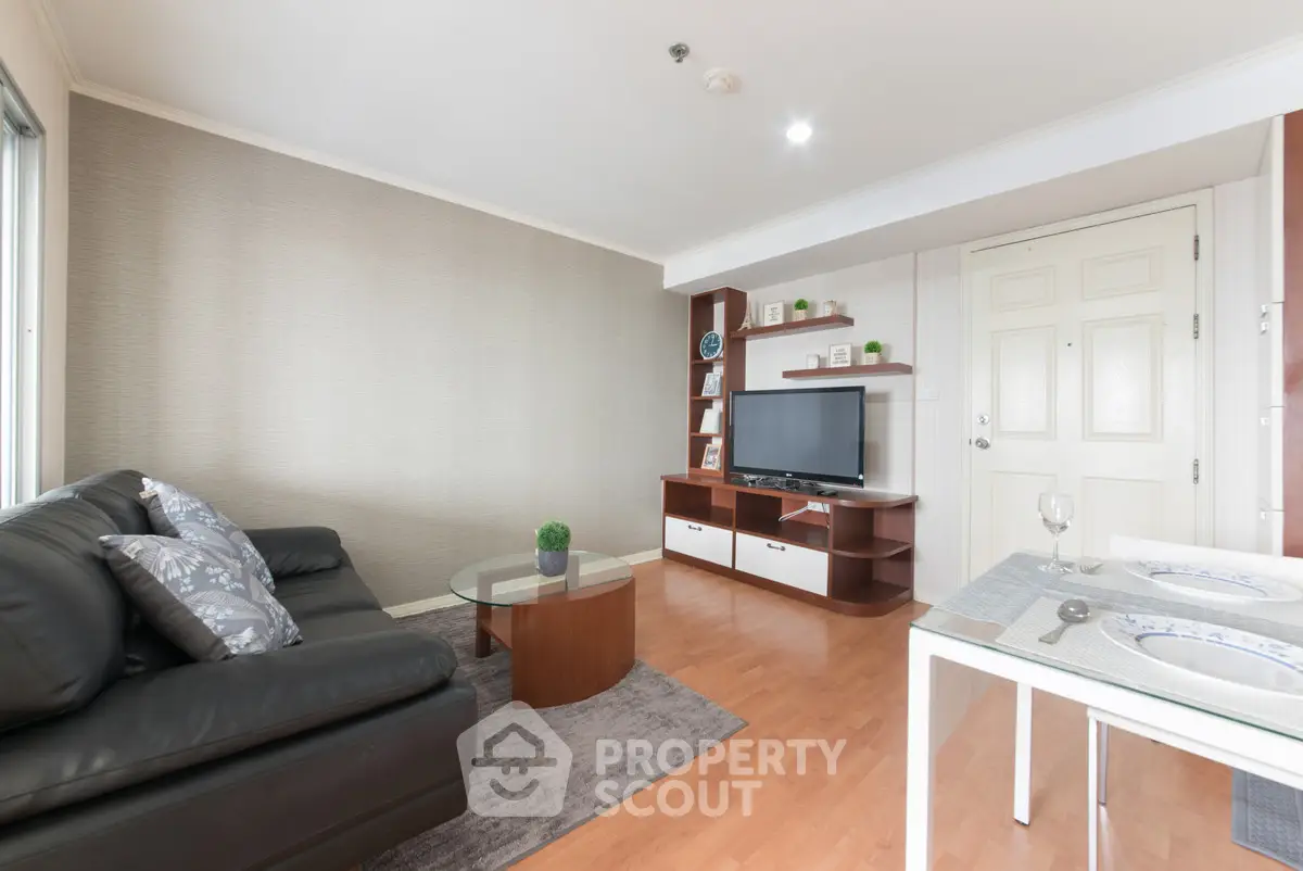Modern living room with sleek furniture and stylish decor, perfect for relaxation and entertainment.