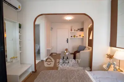 Modern studio apartment with cozy living area and stylish decor