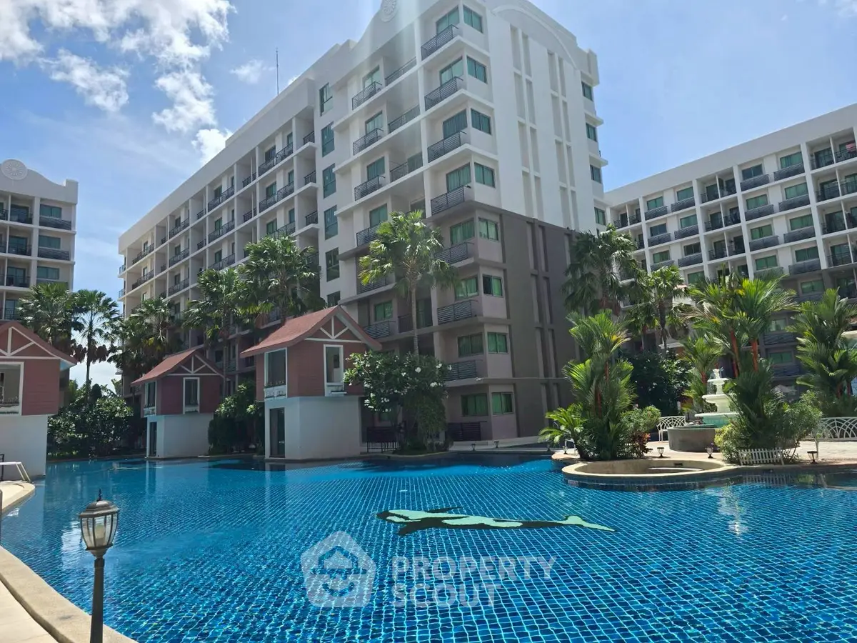 Luxurious condominium with stunning pool and lush landscaping, perfect for resort-style living.
