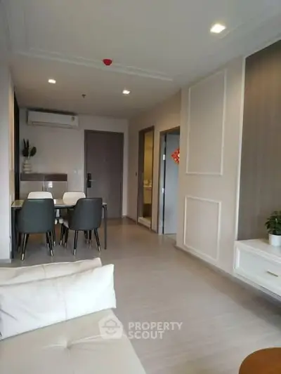 Modern living room with dining area and stylish decor