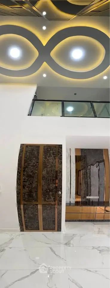 Luxurious modern interior with marble flooring and unique ceiling design