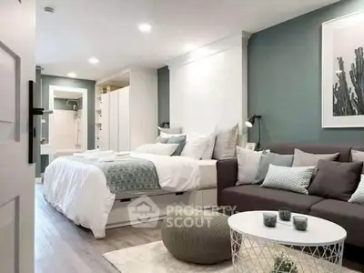 Modern studio apartment with stylish decor and cozy furnishings