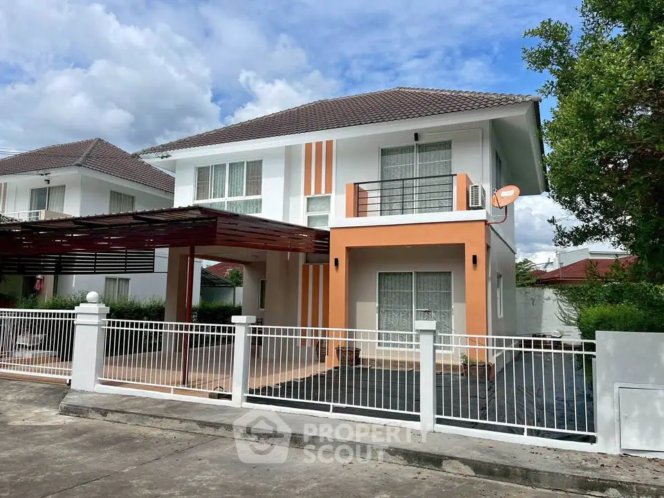 Charming two-story house with modern design and spacious driveway in a serene neighborhood.