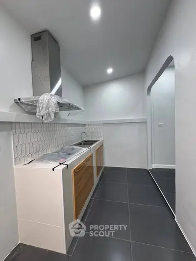 Modern kitchen with sleek design and ample storage space