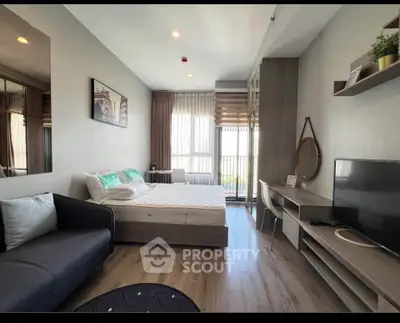 Modern studio apartment with stylish decor and natural light