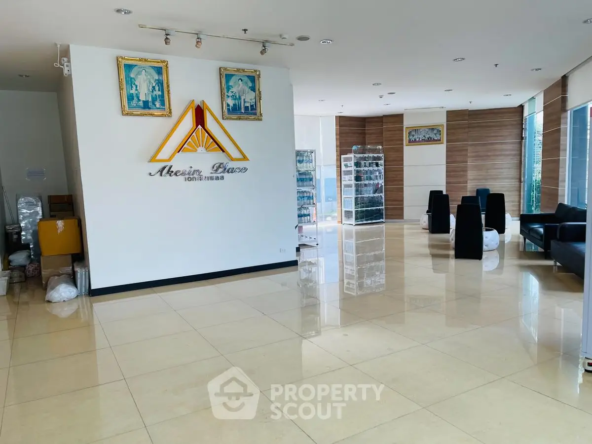 Spacious modern lobby with elegant decor and ample natural light