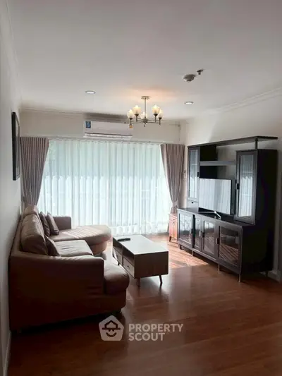 Spacious living room with elegant furniture and natural light