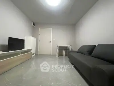 Modern minimalist living room with sleek furniture and neutral tones