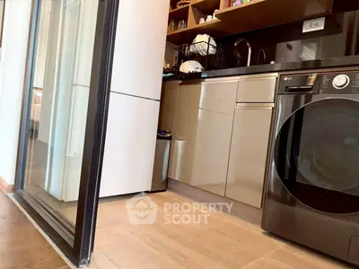 Modern kitchen with sleek appliances and open layout