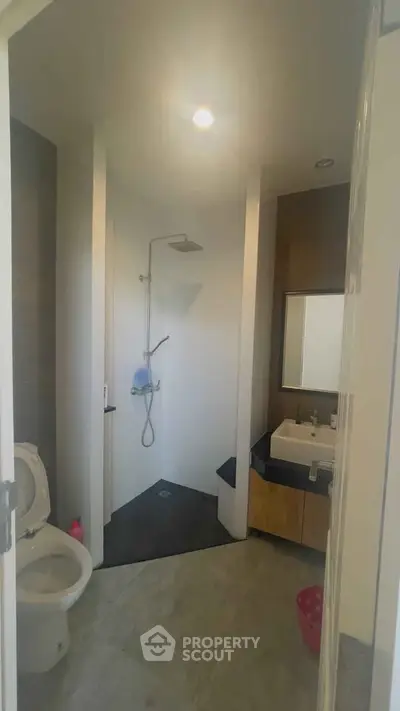 Modern bathroom with sleek shower and stylish sink area