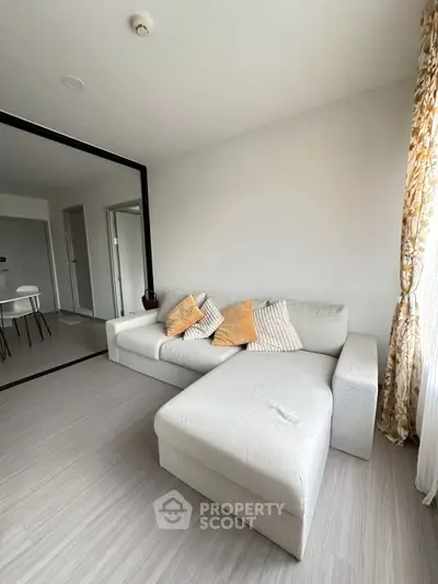Modern living room with stylish sectional sofa and elegant decor