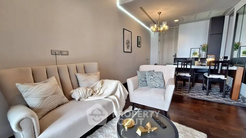 Elegant living room with plush seating and modern dining area, perfect for stylish urban living.