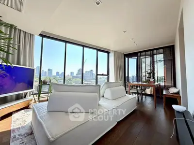 Luxurious living room with panoramic city view and modern decor