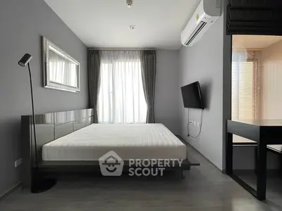 Modern minimalist bedroom with sleek furniture and natural light