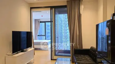 Modern living room with sleek furniture and balcony view in urban apartment