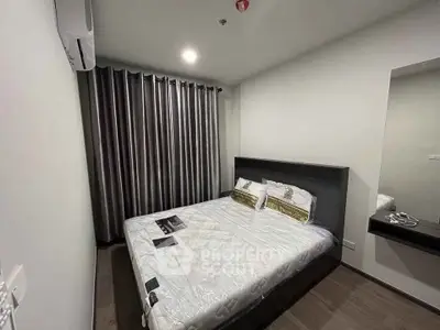 Modern bedroom with sleek design and cozy ambiance