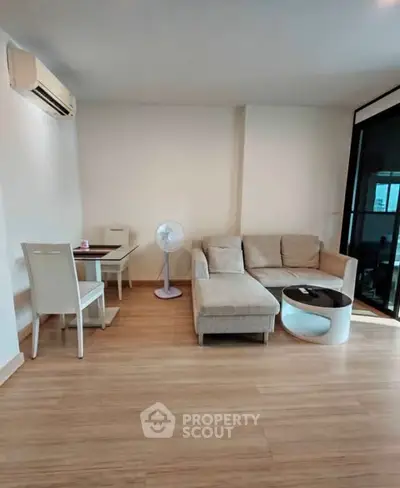 Cozy living room with modern furniture and wooden flooring