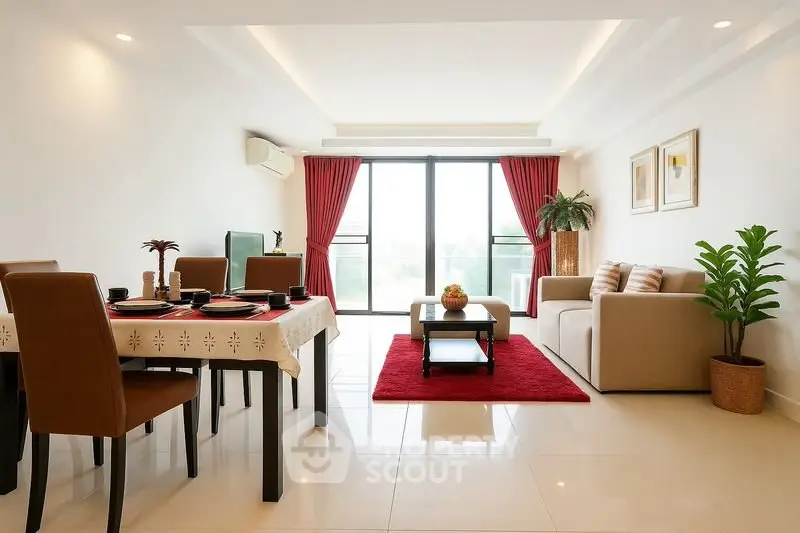 Spacious modern living room with elegant dining area and large windows.