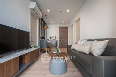 Modern living room with sleek furniture and open layout