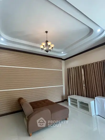 Elegant living room with modern ceiling design and stylish furniture