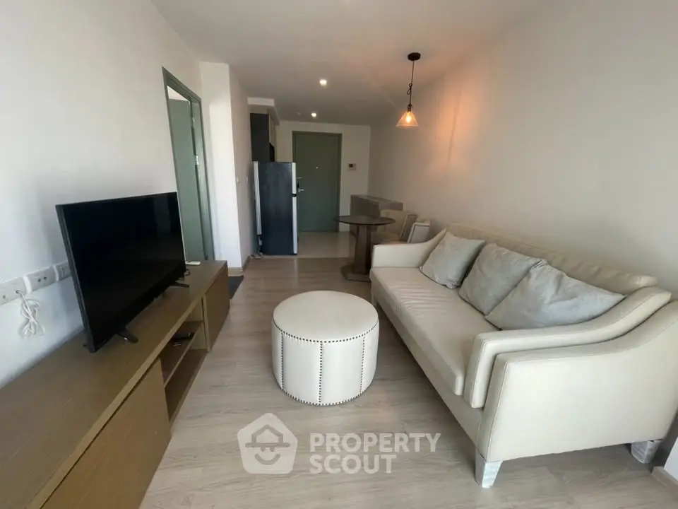 Modern living room with stylish furniture and open layout in a contemporary apartment.