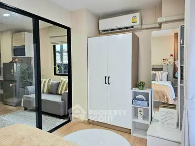Modern bedroom with air conditioning and stylish decor in a cozy apartment.