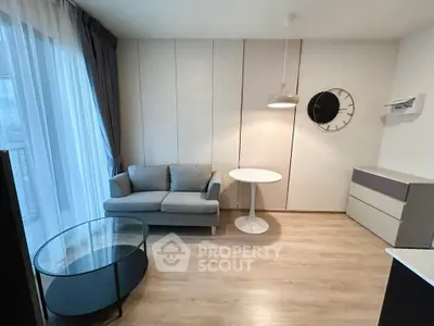 Modern living room with stylish furniture and natural light