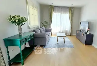 Bright and cozy living room with modern furniture and natural light