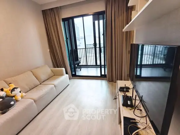 Modern living room with balcony view and stylish decor