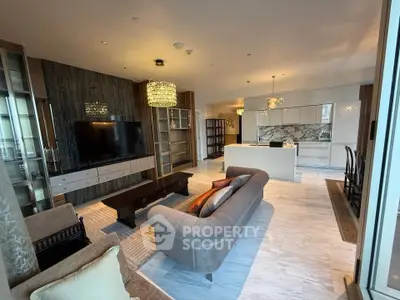 Luxurious open-plan living room with modern kitchen and elegant decor