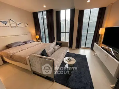 Luxurious modern bedroom with floor-to-ceiling windows and elegant decor.