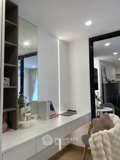 Modern study area with sleek desk and shelving in a stylish apartment