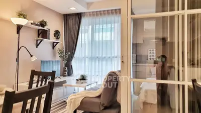 Chic modern living room with stylish decor and cozy ambiance, perfect for urban living.