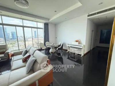 Spacious modern living room with city view and elegant furnishings