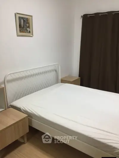 Cozy bedroom with minimalist decor and natural light