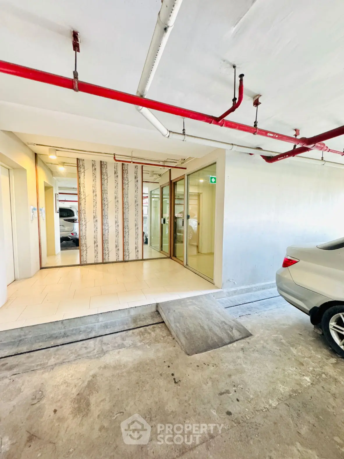 Modern parking area with sleek design and convenient access to elevators.