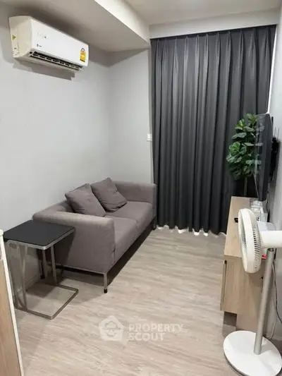 Cozy modern living room with air conditioning and stylish decor